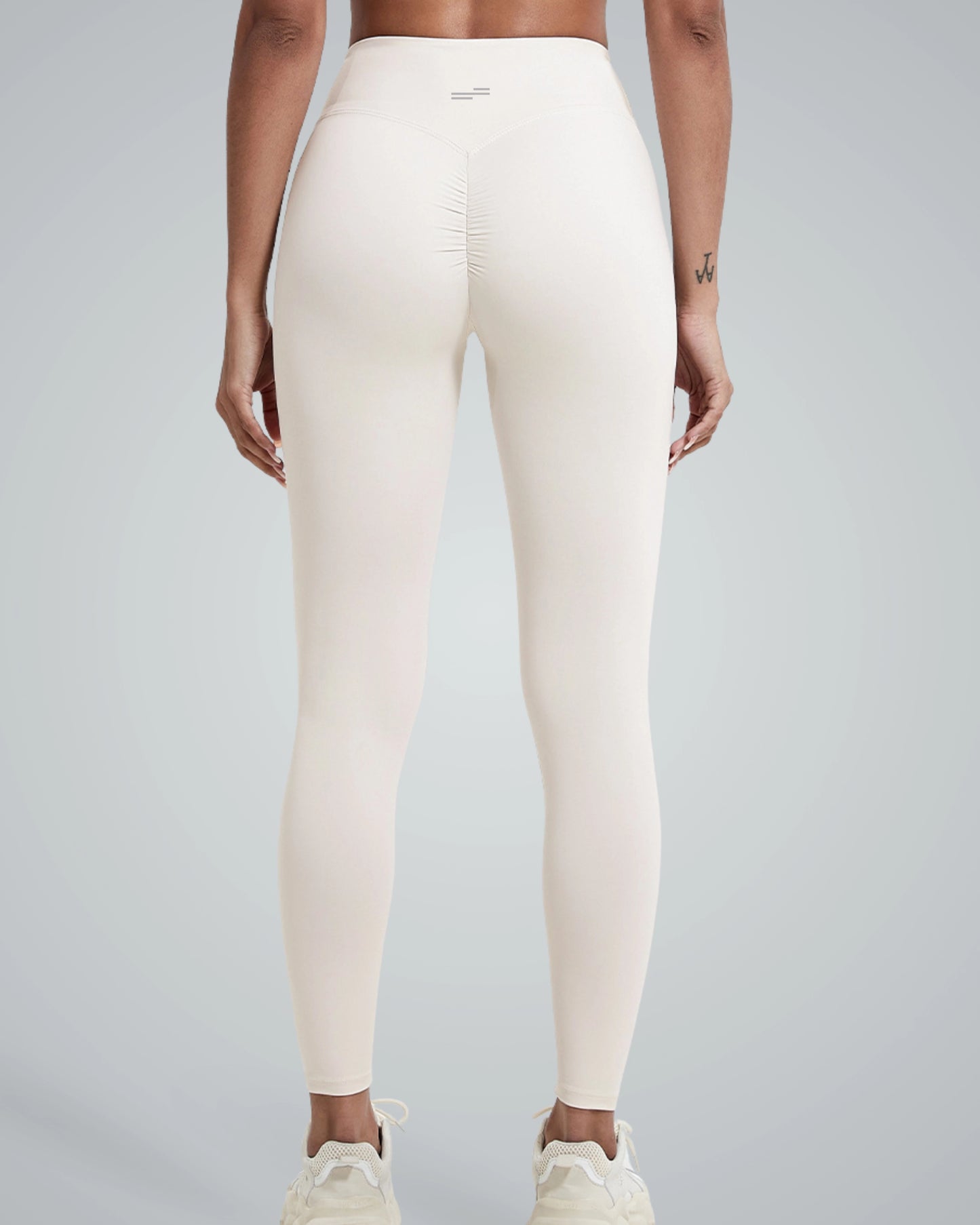Bandsam Coral Crush Leggings showcasing flexible, scrunch-back design for women's comfort in yoga, pilates, and outings.