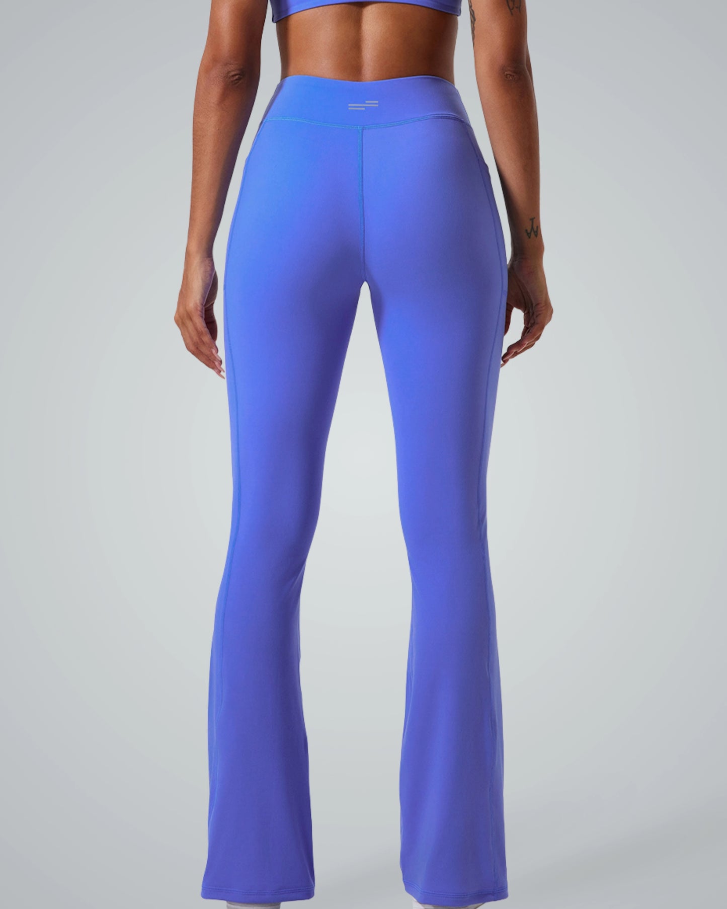 Bandsam PeakFit Pocket Leggings in blue, high-waisted flared design with side pockets. Ideal stretch activewear for women, yoga, pilates, and lounging.