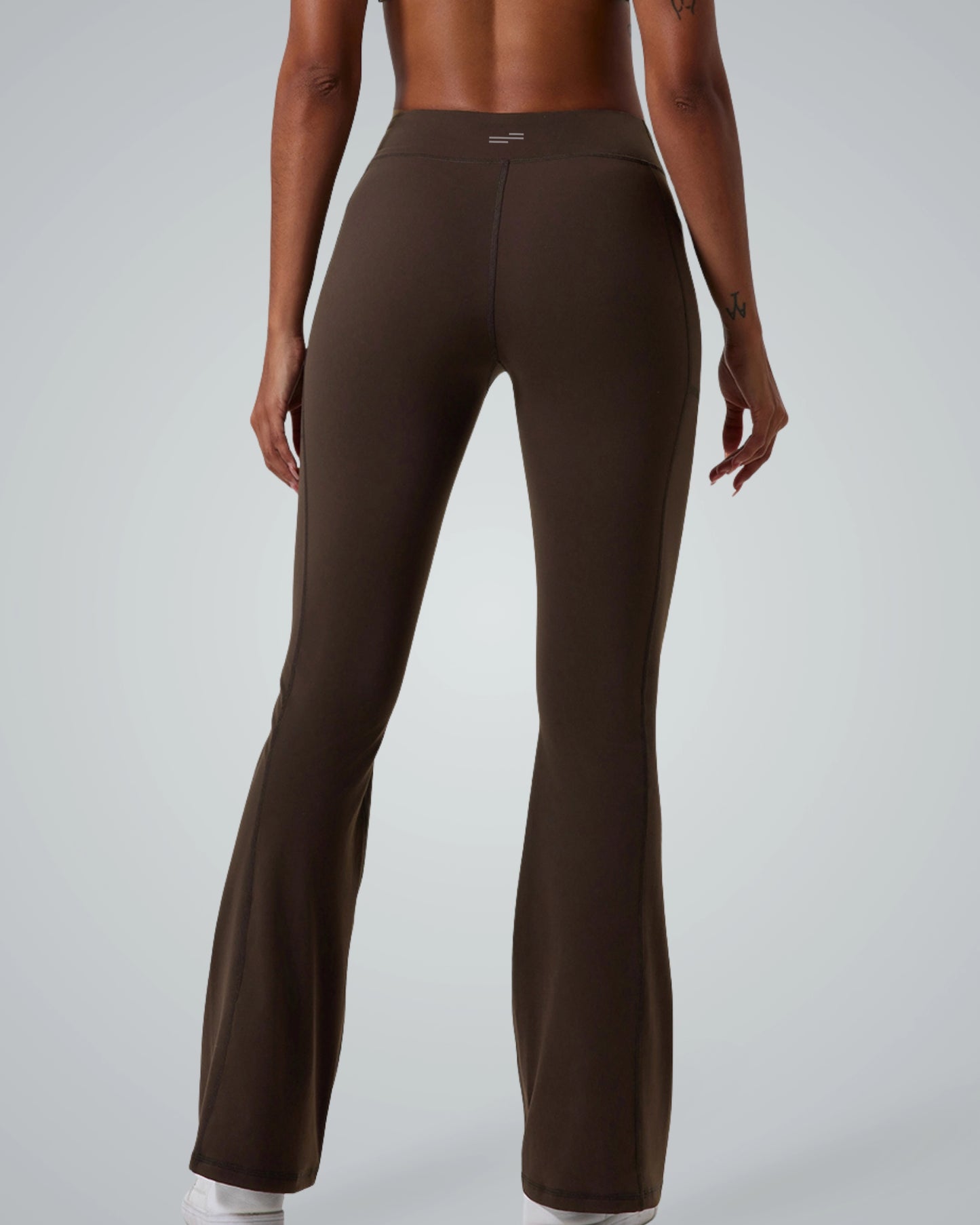 Rear view of Bandsam PeakFit Pocket Leggings in brown, high-waisted and flared, ideal for stretch, comfort, activewear, workout, and yoga.