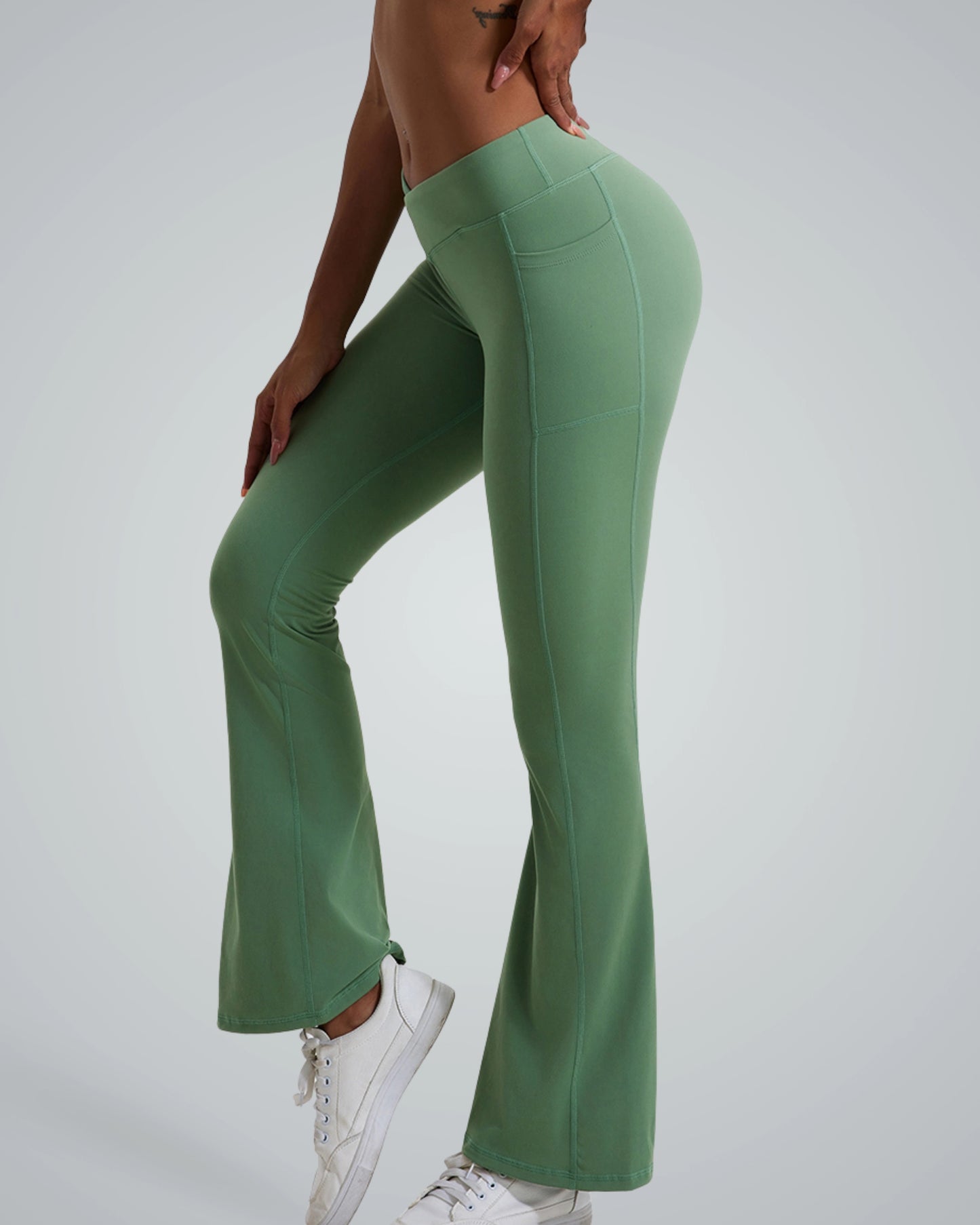 Bandsam PeakFit Pocket Leggings in green, high-waisted flared design, ideal for yoga, pilates, or outings with comfort, flexibility, and style.