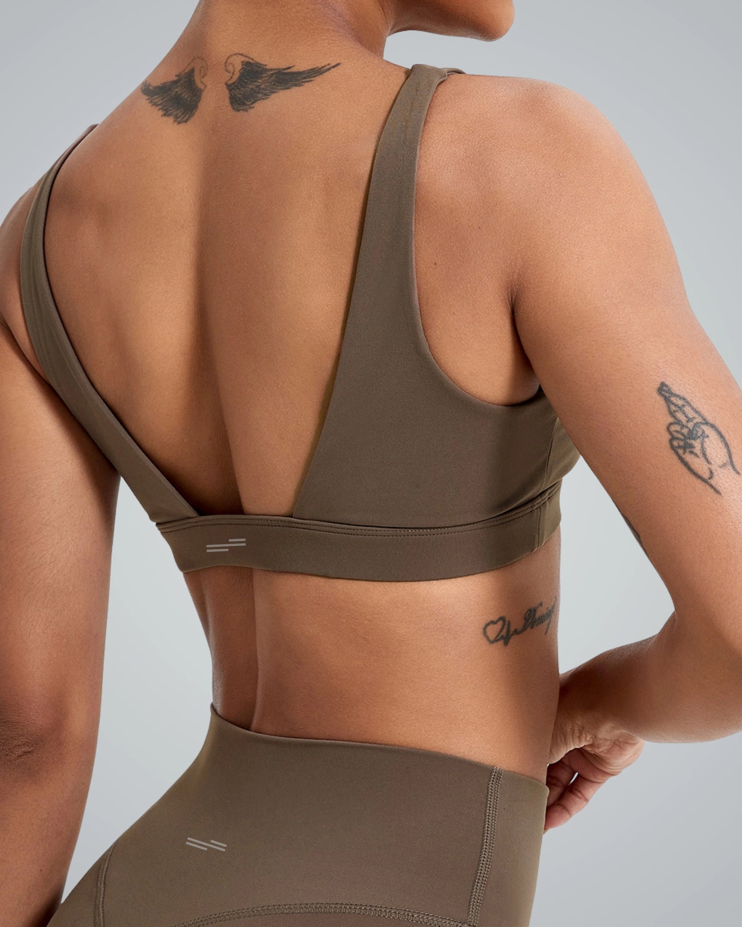 Back view of Bandsam pureflex set with V-neck sports bra and high-waisted leggings, perfect for seamless gym or yoga sessions.