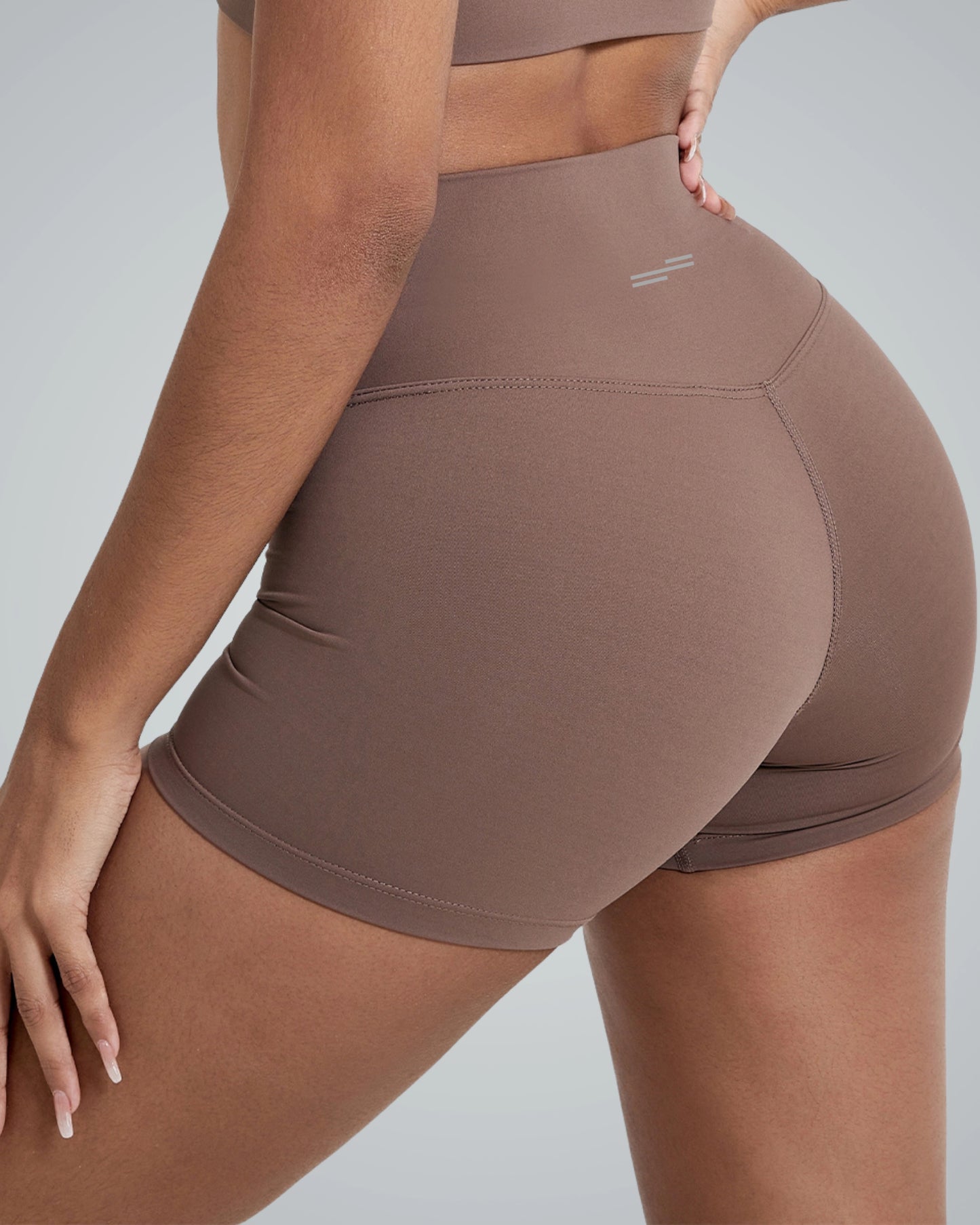 Usa Bandsam VibrantMove Short in brown, showcasing stretch fabric, ideal for yoga, pilates, lounging or workouts; designed for comfort and support.