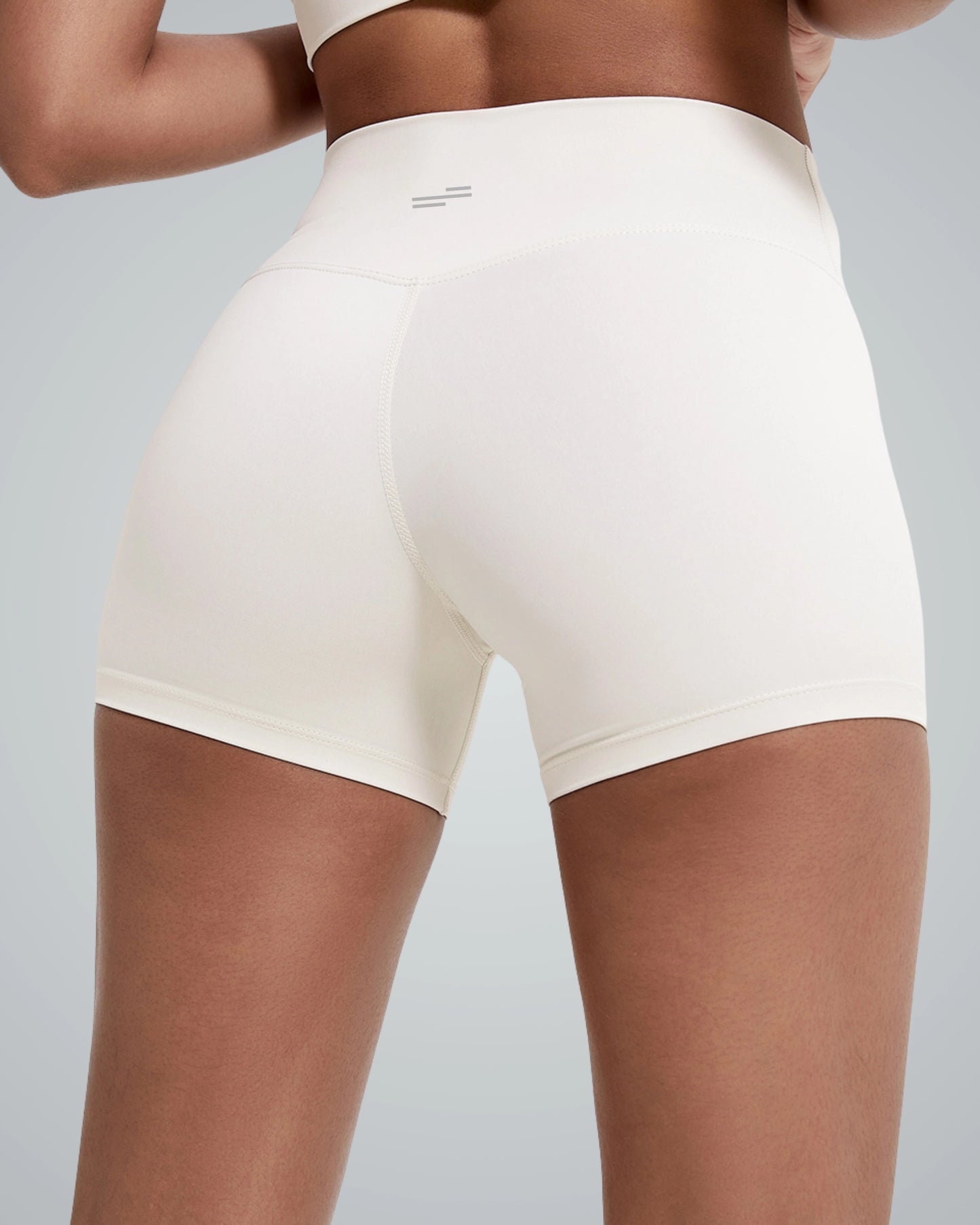 Bandsam VibrantMove Shorts for women in white, showcasing stretch, flexibility, and comfort. Perfect for yoga, workout, or lounging.