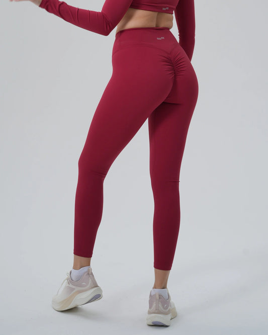 Bandsam women's AllureFit leggings in red, showcasing stretch and support for yoga, pilates, workout, or lounging. Flexible activewear.