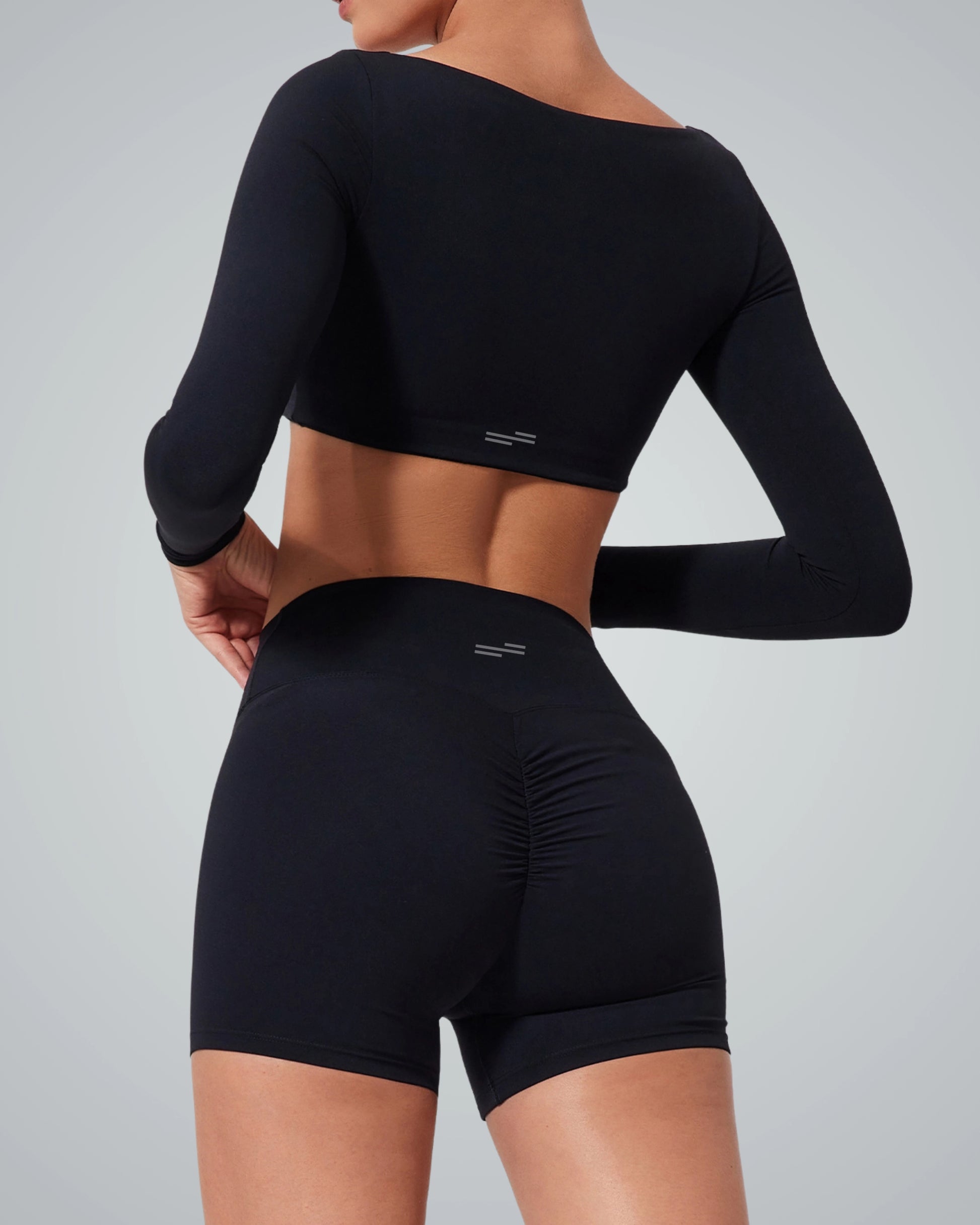 Stylish woman wearing Bandsam BalanceLine Top, showcasing a cozy fit perfect for yoga and daily wear.
