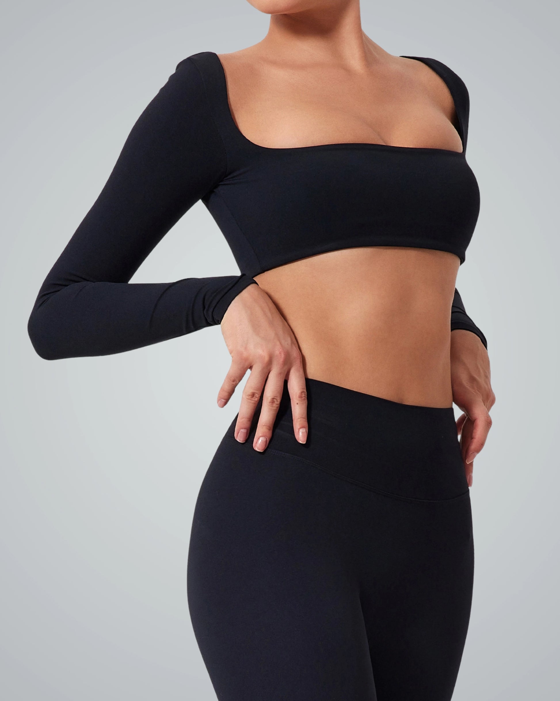 BalanceLine Top by Bandsam, showcasing a sleek black design perfect for yoga and everyday wear.