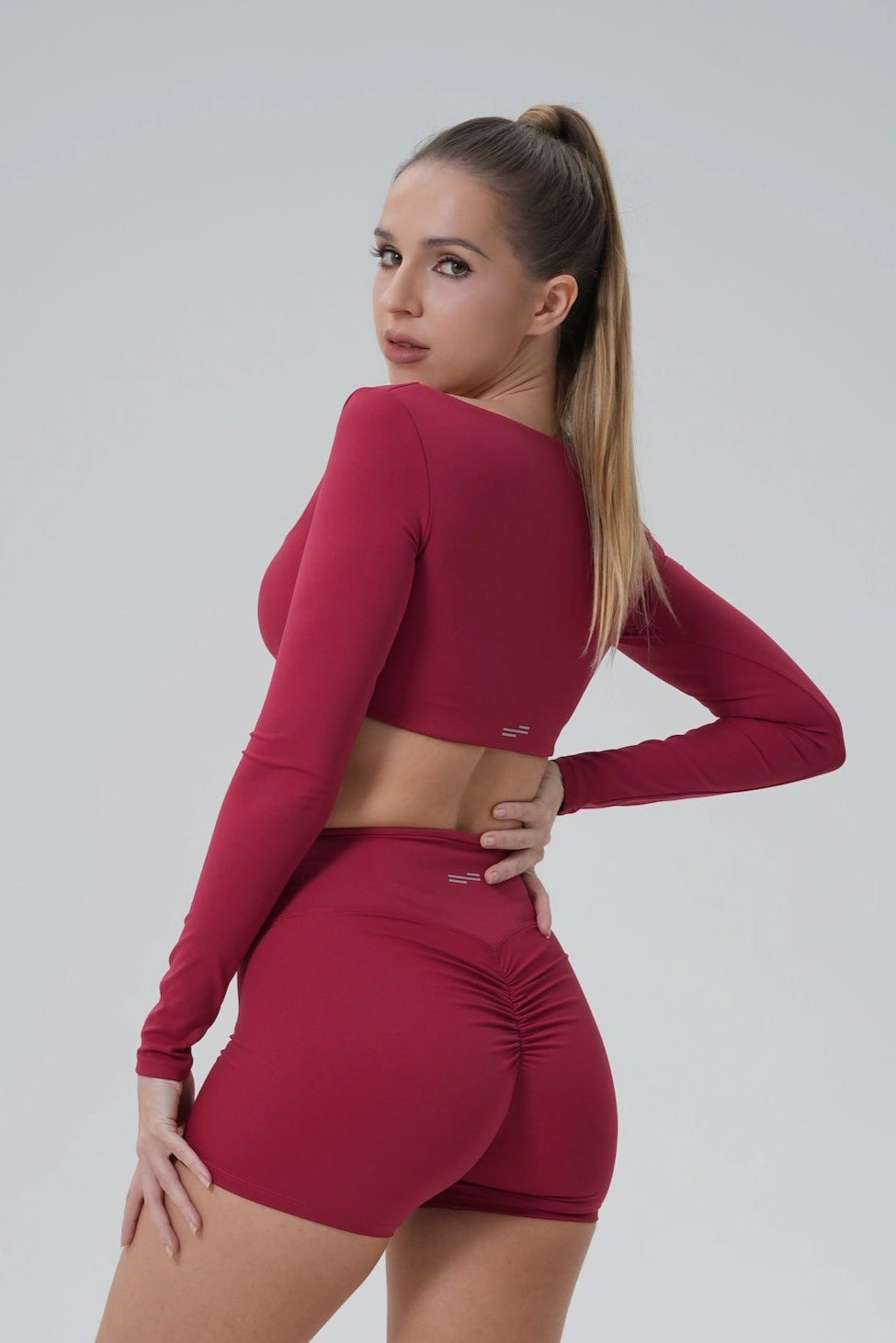 BalanceLine Top by Bandsam in burgundy, featuring a fitted design for yoga and everyday wear, combining style and comfort.