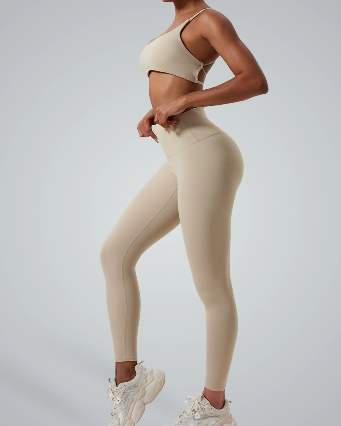 Bandsam ContourCore matching workout set featuring seamless gym yoga set for women in beige; high-waisted sculpting leggings and bra.