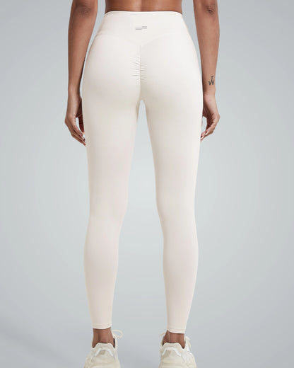 Bandsam Coral Crush Leggings showcasing flexible, scrunch-back design for women's comfort in yoga, pilates, and outings.