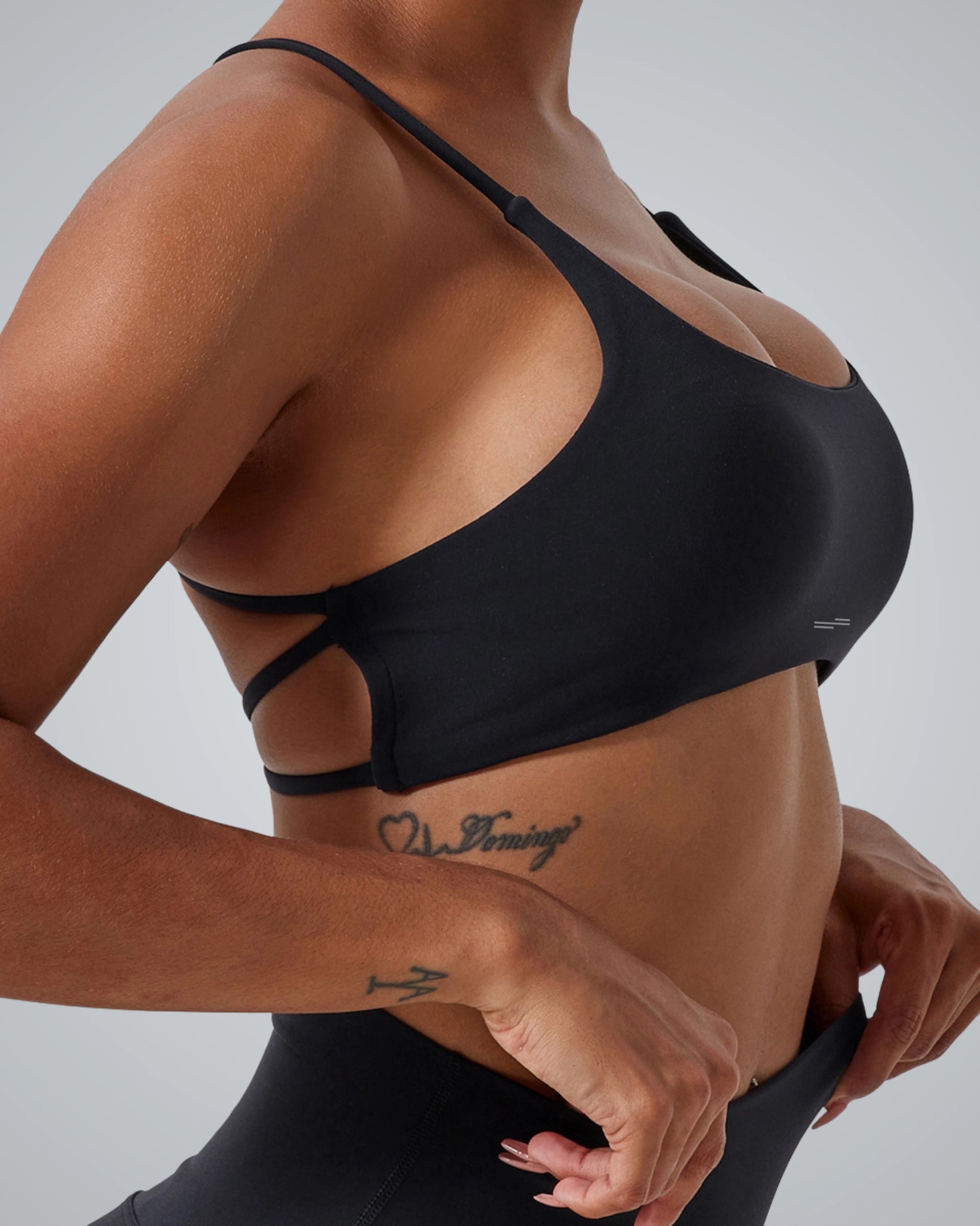 Bandsam CrossFlow Bra for women in black, designed for yoga and workout with stretch, soft, moisture-wicking fabric for activewear.