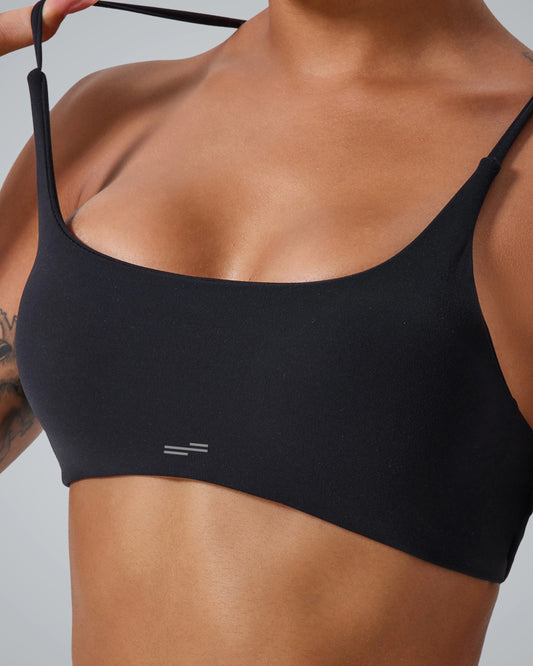 Bandsam Cross Flow Bra in black; stretchable, soft activewear for women. Ideal for yoga and workouts. Moisture-wicking fabric.
