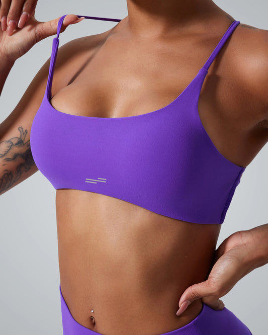 Purple Bandsam Cross Flow Bra for women, featuring breathable, moisture-wicking fabric for yoga and workouts. Soft, stretch activewear.