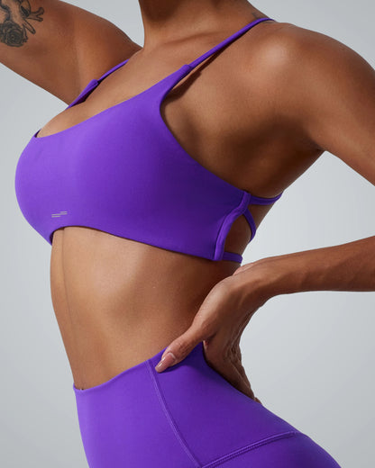 Bandsam Cross Flow Bra in purple, designed with stretch, breathable fabric, ideal for women's yoga and workout activewear.