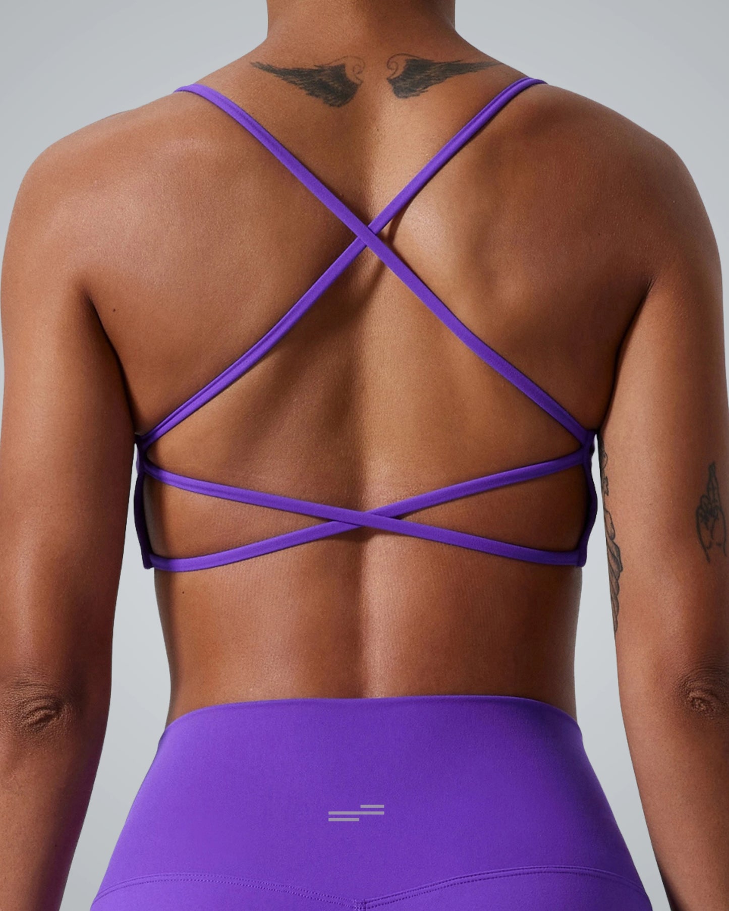 Bandsam CrossFlow Bra in purple, featuring breathable, moisture-wicking fabric for women. Ideal for yoga and workouts. Stretch activewear.