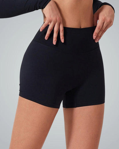 Bandsam CurveEnhance Shorts highlighting a woman's silhouette, perfect stretch activewear for comfort, yoga, pilates, and lounging.
