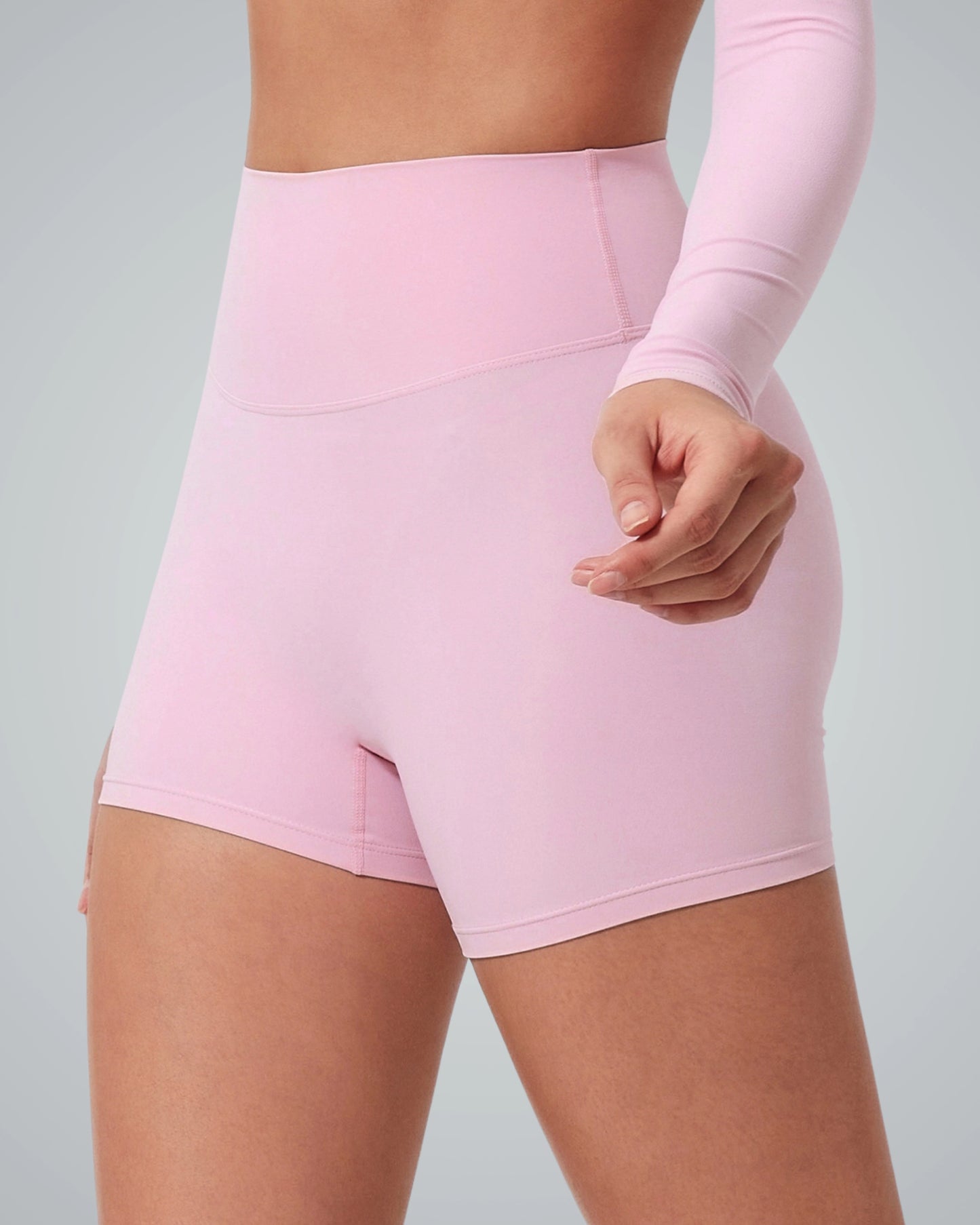 Bandsam CurveEnhance Shorts in pink for women, highlighting stretch, comfort, support, and flexibility for yoga, pilates, or outings.