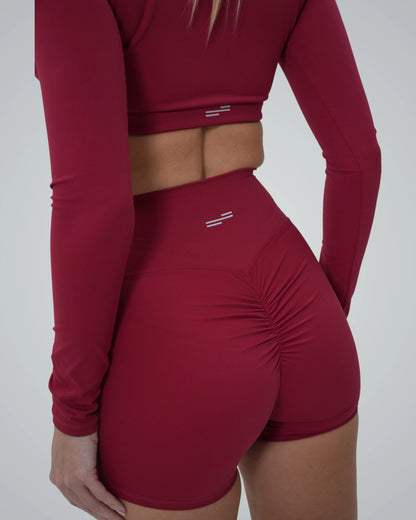 Bandsam CurveEnhance Shorts in red, designed for women's stretch, comfort, and support, perfect for yoga, workout, and relaxation.