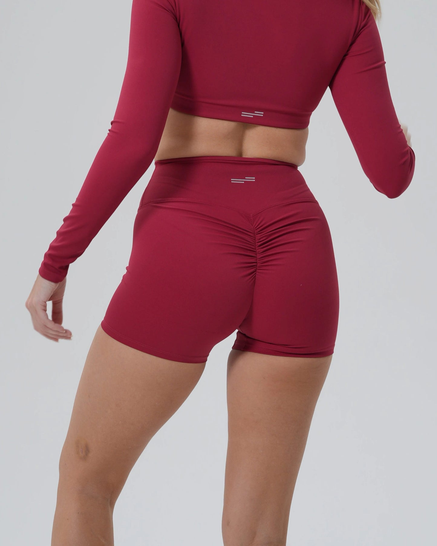 Bandsam CurveEnhance Shorts for women in red, showcasing stretch comfort and support, perfect activewear for yoga, pilates, and lounging.