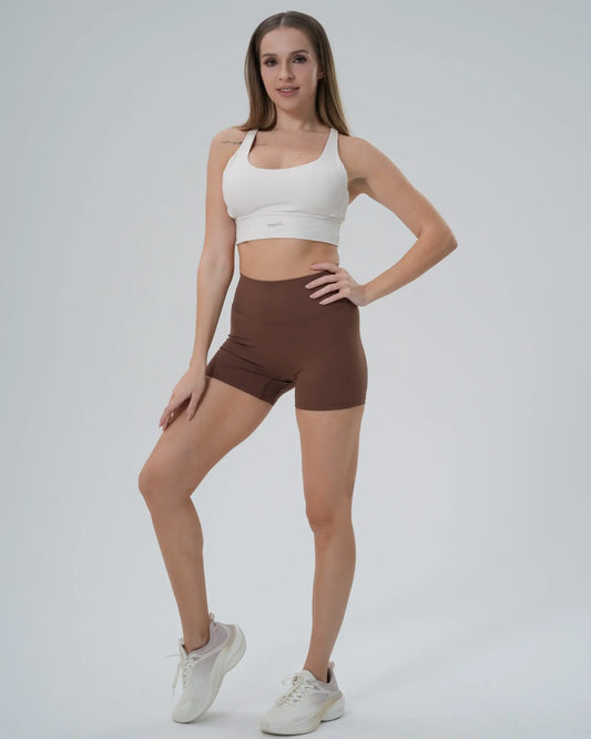 Bandsam Edge Pro Set featuring a white sports bra and brown shorts, perfect for yoga, athleisure co-ord, and seamless gym performance.