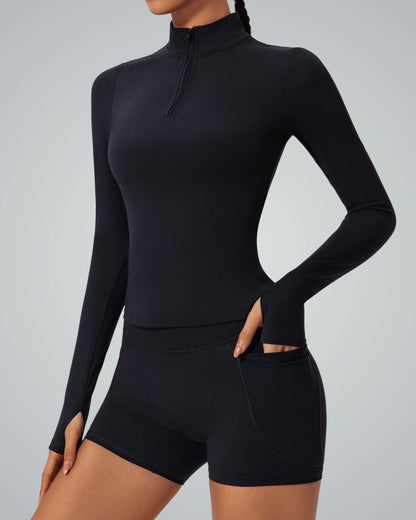 Bandsam FluidForce high-neck long sleeve and shorts, seamless gym set, elegant performance wear for women, minimalist activewear design.