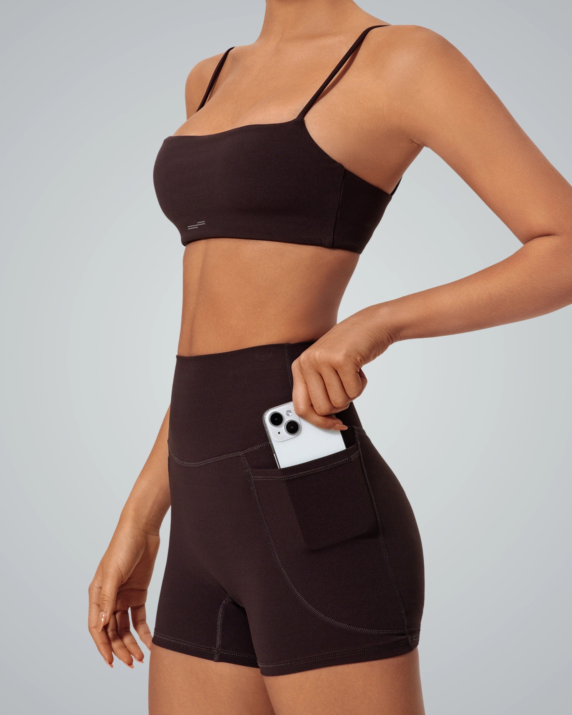 Bandsam FluidForce seamless two-piece activewear set with sports bra and pocketed high-waisted shorts in minimalist design