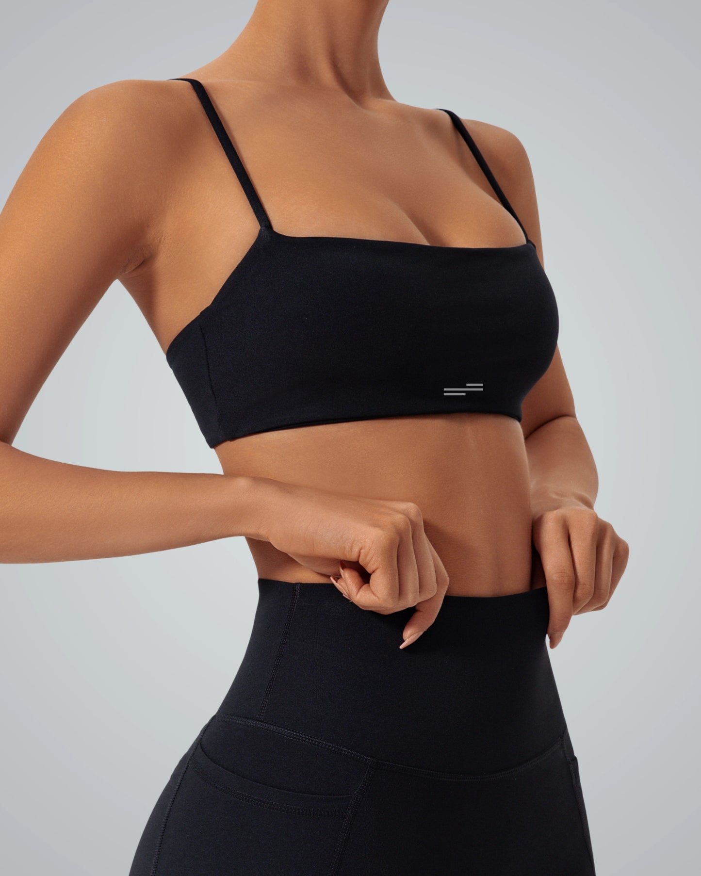 Bandsam GlowLift Bra in black offering comfort, support, and flexibility for women; ideal for yoga, pilates, lounging, or activewear.