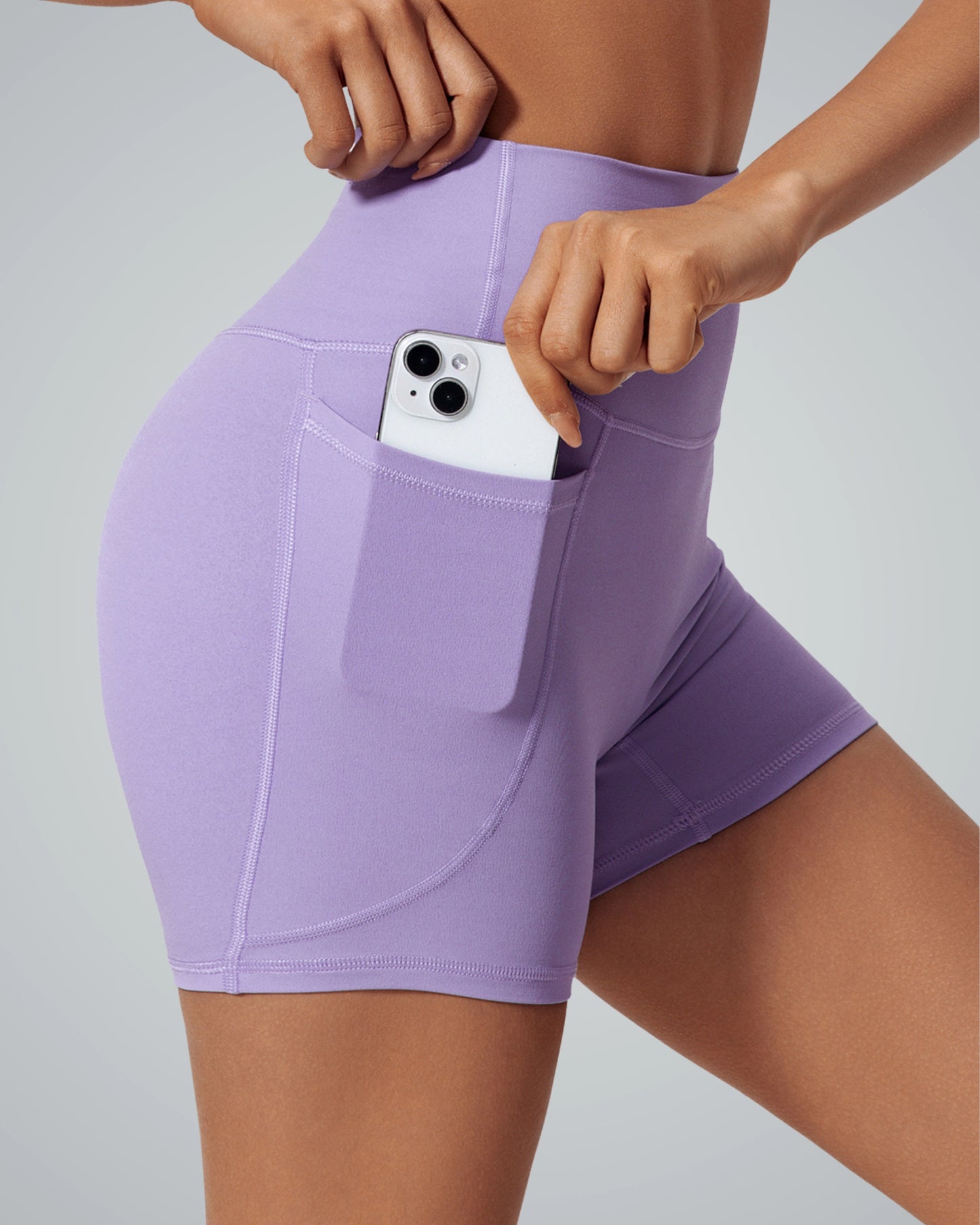 Bandsam LilaFit Shorts in lavender, showcasing a flexible, high-rise design with a handy pocket for activewear, yoga, and lounging.