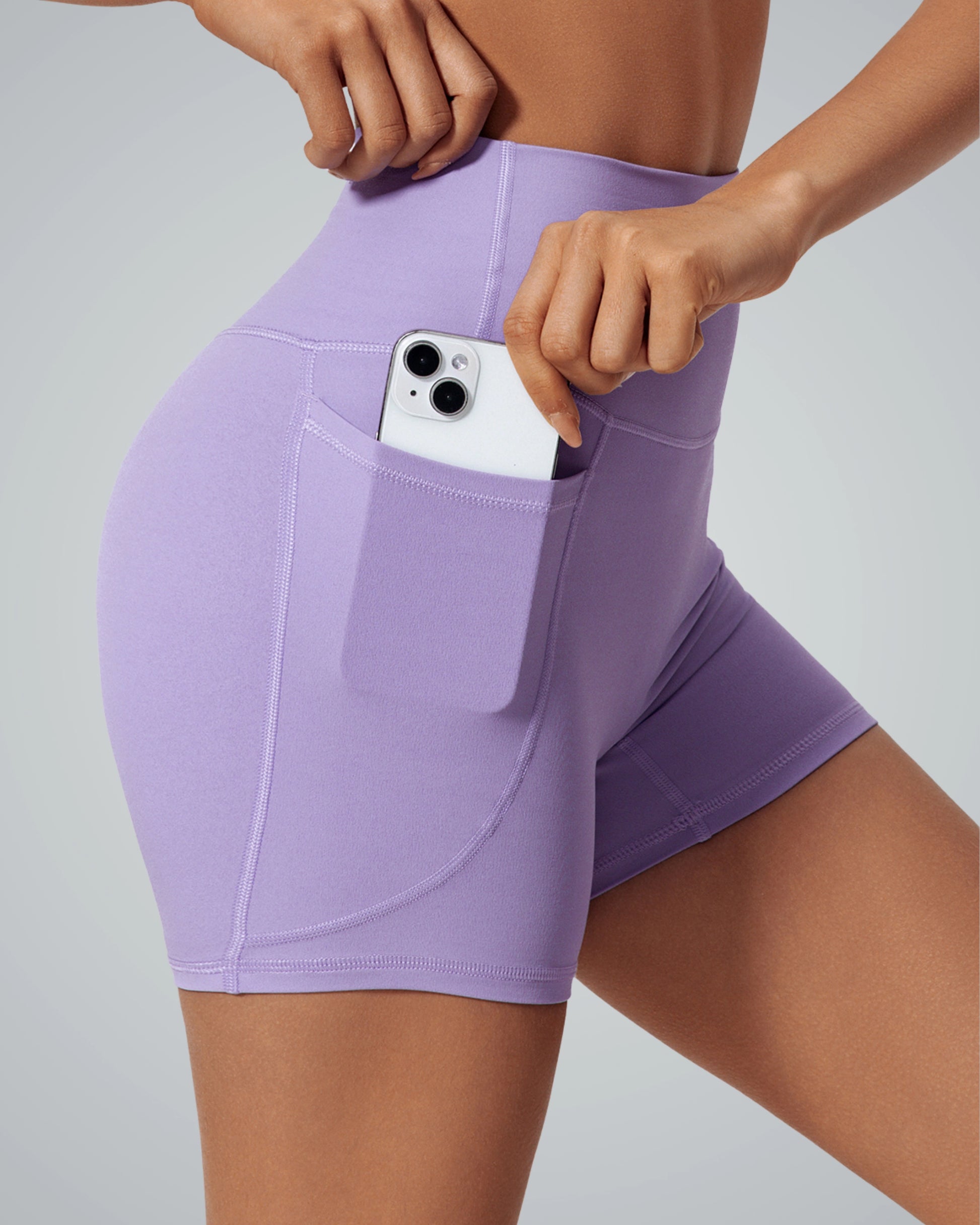 Bandsam LilaFit Shorts in lavender, showcasing a flexible, high-rise design with a handy pocket for activewear, yoga, and lounging.