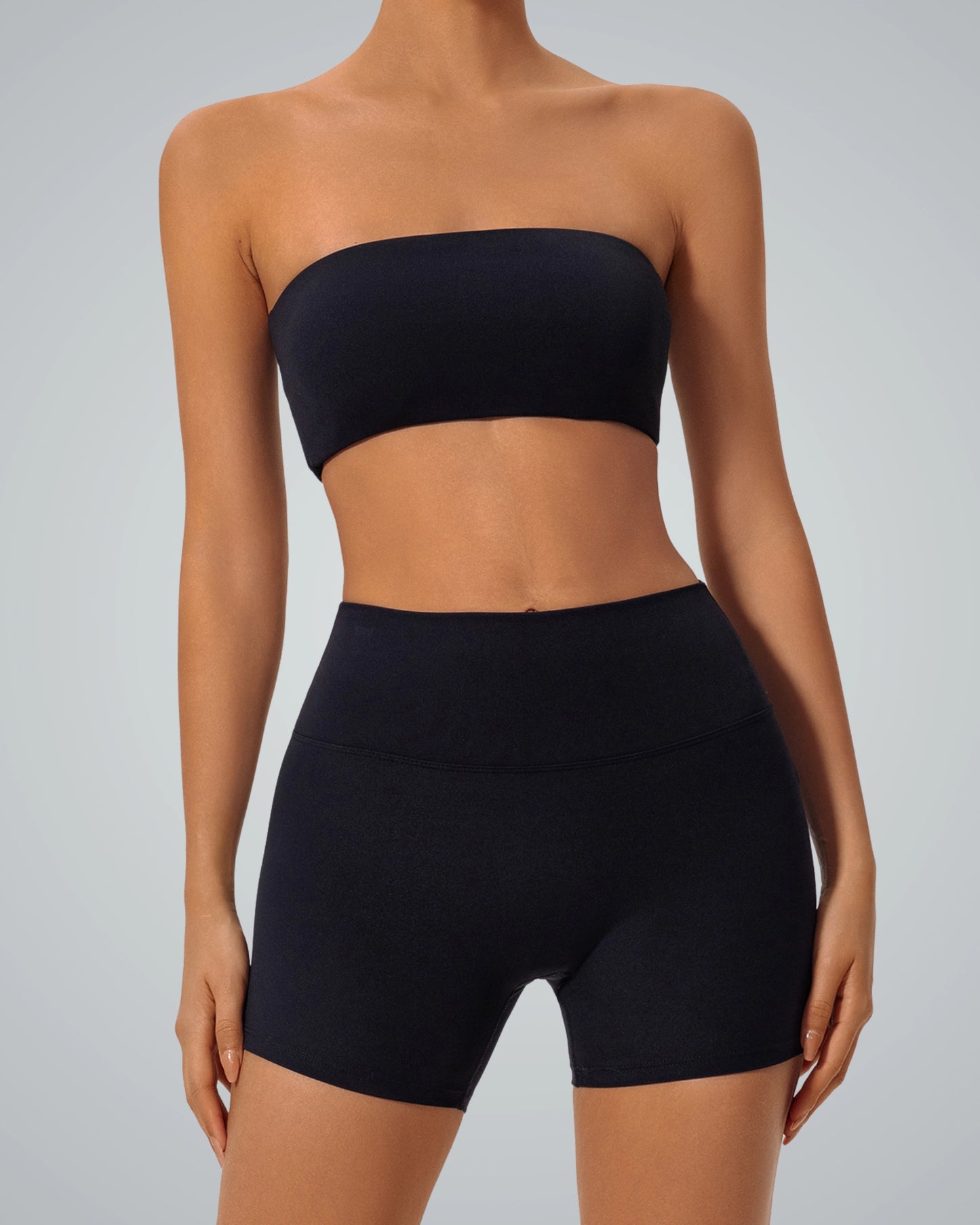 Woman wearing Bandsam LushBreeze strapless bra, showcasing stretch activewear for lounging or yoga. Ultra-soft, flexible support.