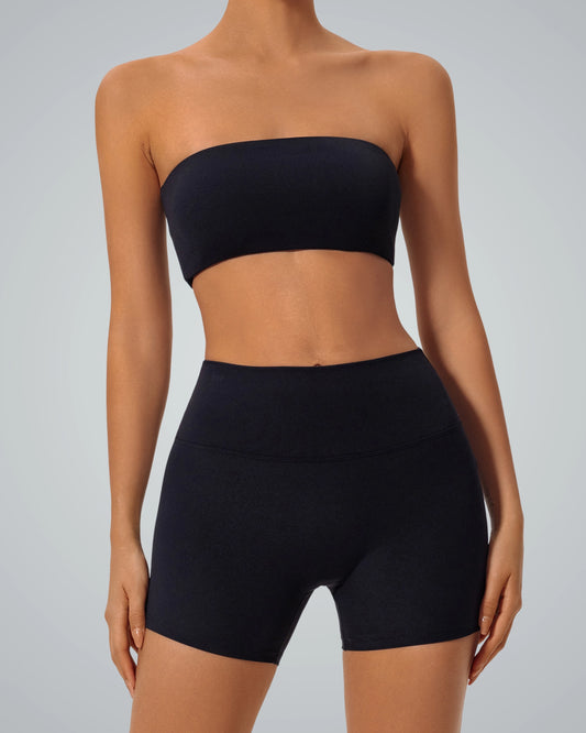 Woman wearing Bandsam LushBreeze strapless bra, showcasing stretch activewear for lounging or yoga. Ultra-soft, flexible support.