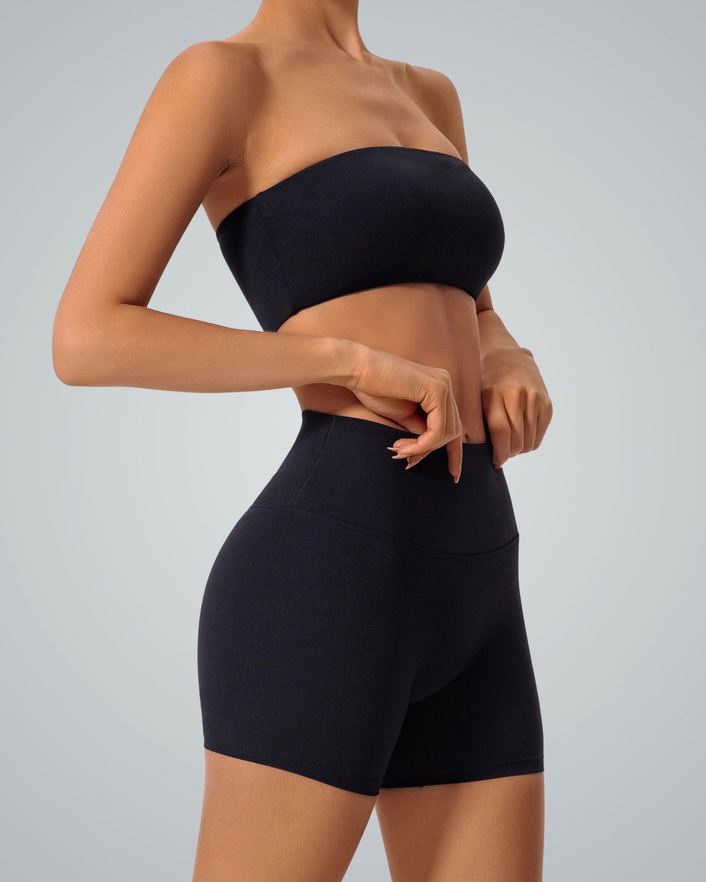 Woman wearing Bandsam LushBreeze Bra, a strapless bandeau for comfort and style, ideal for activewear, yoga, and outings.