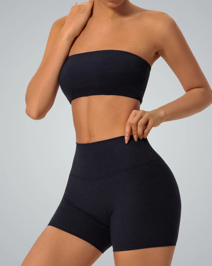 Woman wearing Bandsam LushBreeze Bra in black, showcasing stretch comfort, support, and flexible style for yoga, pilates, and lounging.