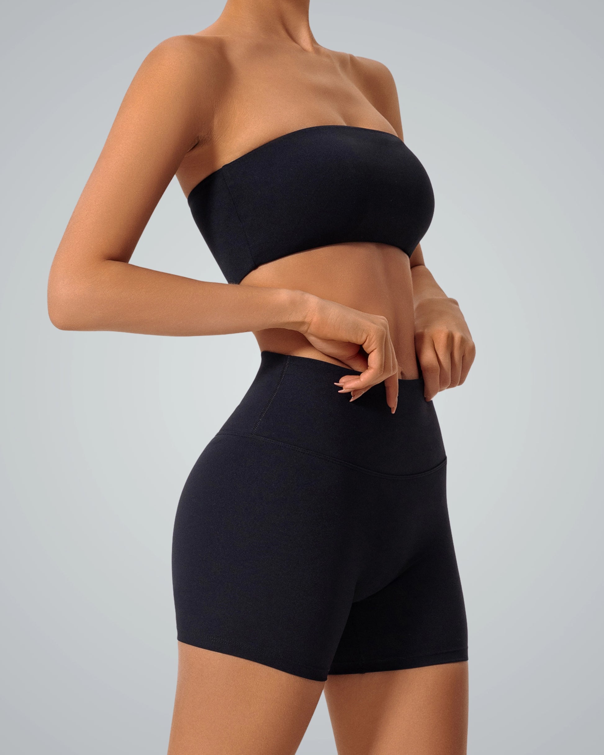 Bandsam LuxeEase Bandeau Set in black, featuring a seamless sports bra and high-waisted shorts, perfect for a stylish athleisure look.