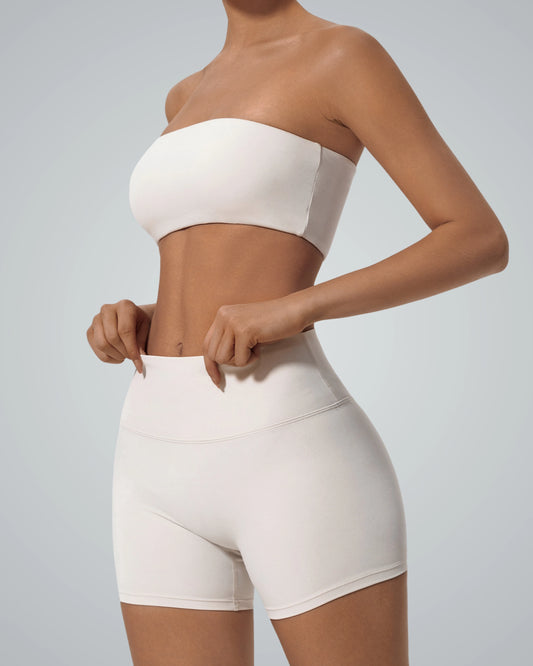Stylish LuxeEase Bandeau Set with seamless bandeau top and high-waisted shorts, perfect for athleisure and yoga, in a minimalist design by Bandsam.