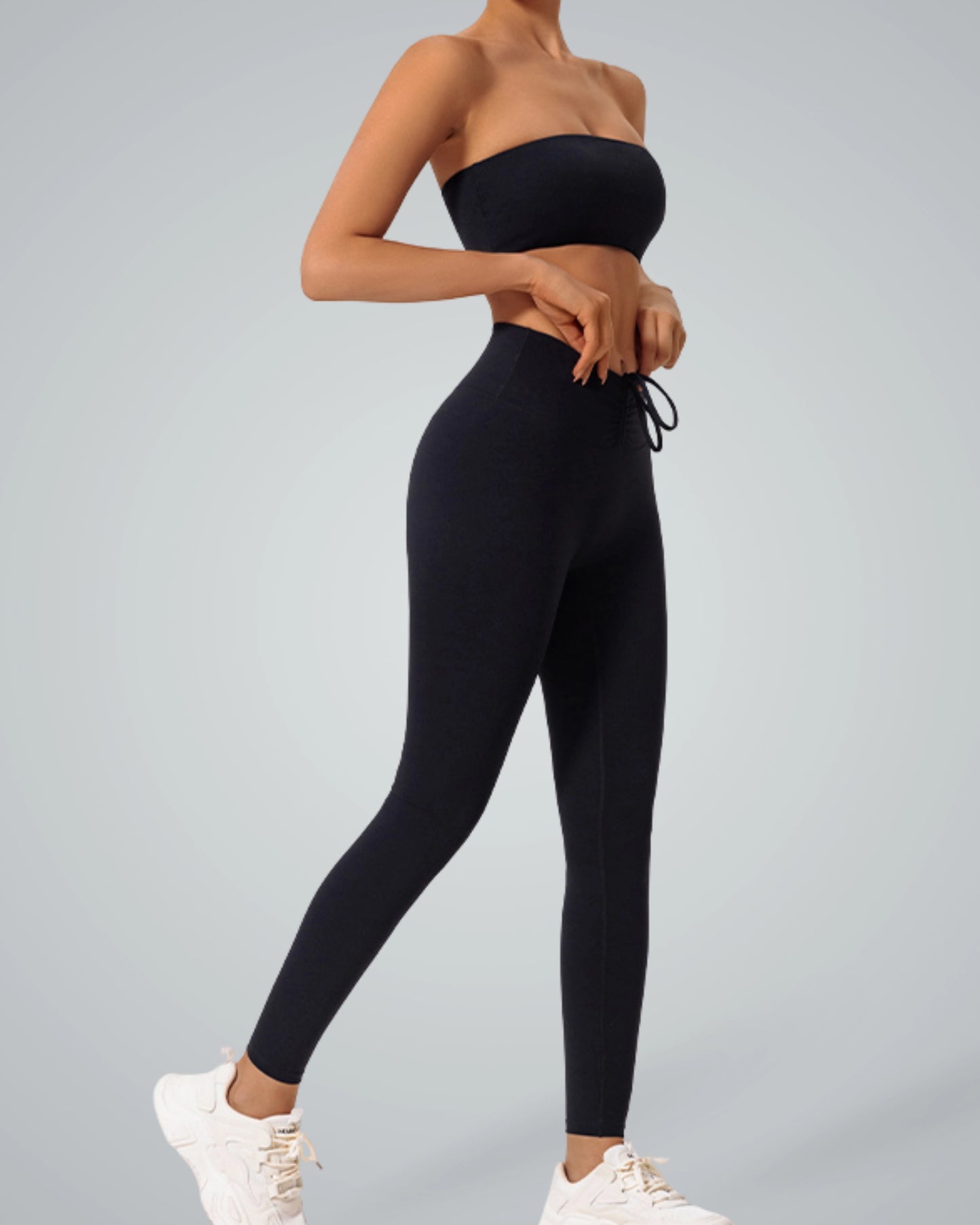 Bandsam LuxePulse Active Set, a seamless gym set with bandeau top and high-rise leggings in minimalist style, ideal for yoga and summer wear.