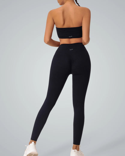 Bandsam LuxePulse Active Set in black, featuring a bandeau top and high-waisted leggings. Perfect seamless gym set or trendy workout co-ord.