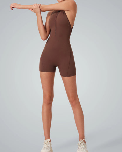 Woman wearing Bandsam Midnight Motion Bodysuit, showcasing stretchy and comfortable sleeveless design for activewear or lounging.