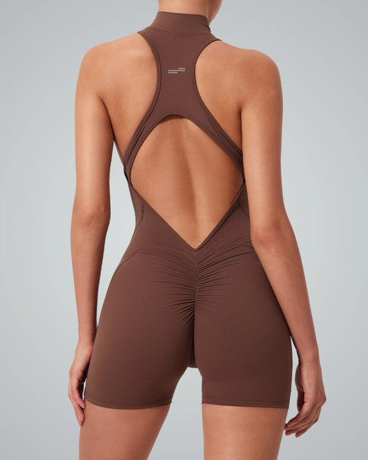 Rear view of woman wearing Bandsam Midnight Motion Bodysuit, showcasing stretch, comfort, support, and flexible design for active women.