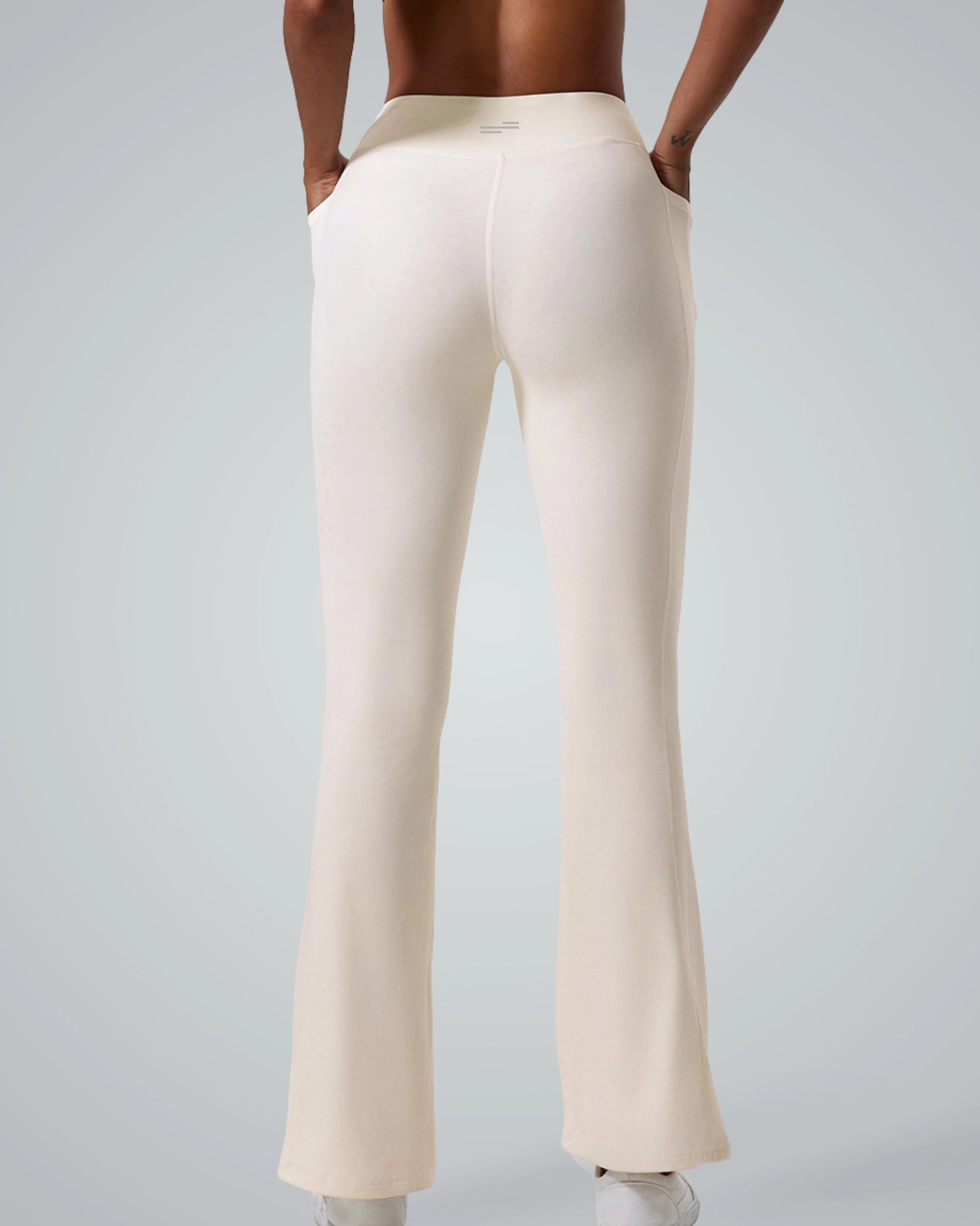 Bandsam PeakFit Pocket Leggings in cream, high-waisted and flared with side pockets, ideal for yoga, pilates, and casual outings.