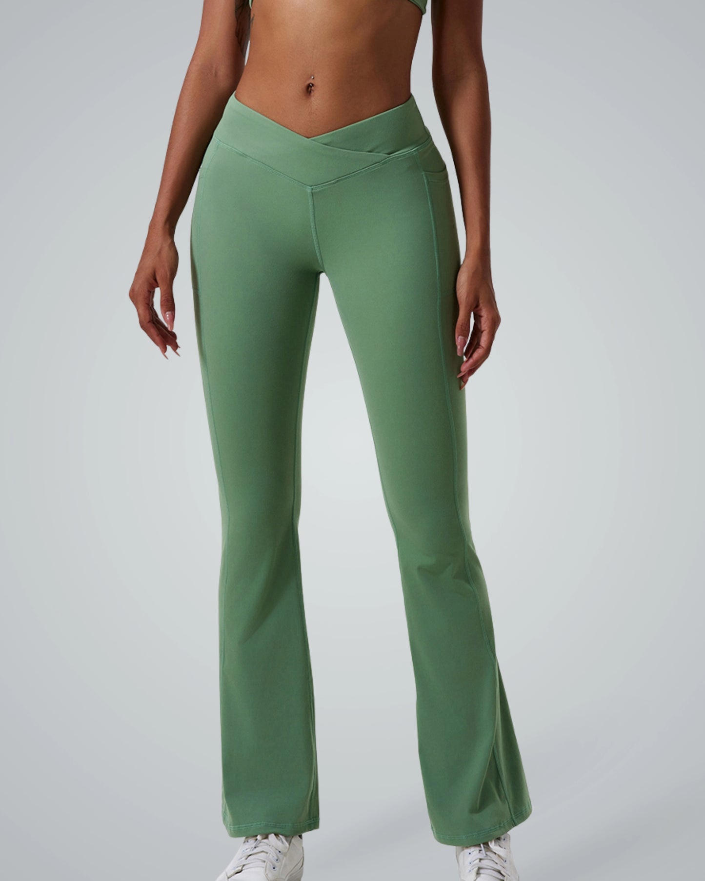Bandsam PeakFit Pocket Leggings in green; high-waisted, flared, stretch activewear for women's comfort, support in yoga or workout.