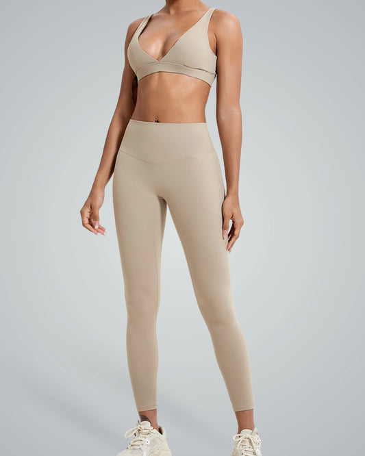 Bandsam PureFlex Set featuring a seamless V-neck sports bra and high-waisted leggings, ideal for chic, adaptable athleisure wear.