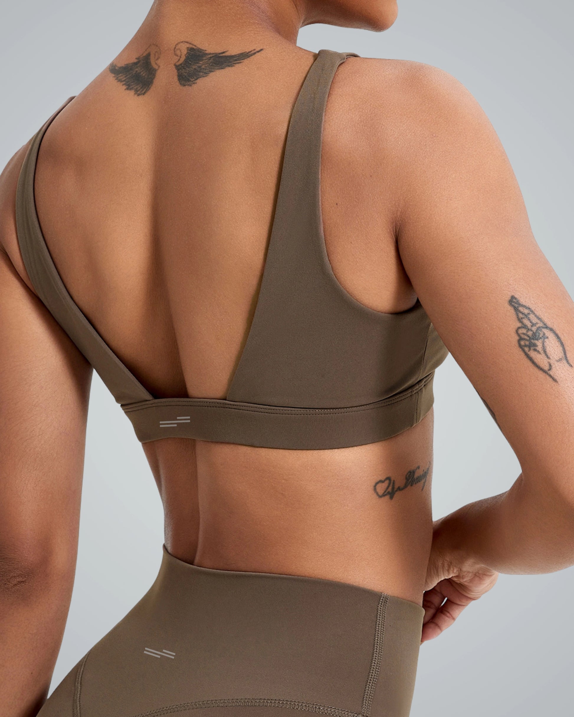 Back view of Bandsam pureflex set with V-neck sports bra and high-waisted leggings, perfect for seamless gym or yoga sessions.