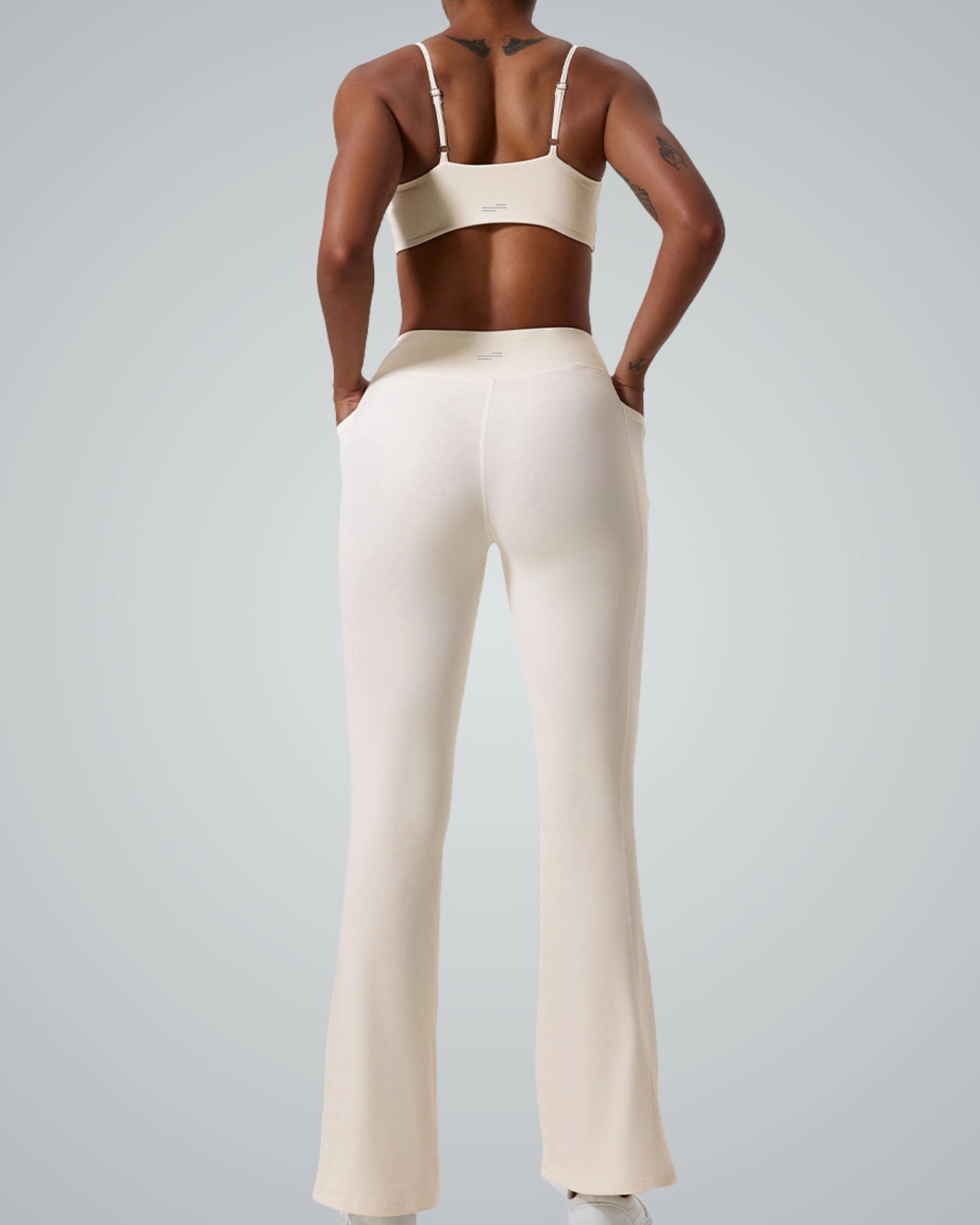 Bandsam SculptEase Set, seamless gym set featuring twist-front sports bra and high-waisted flared trousers, cute workout set for women.