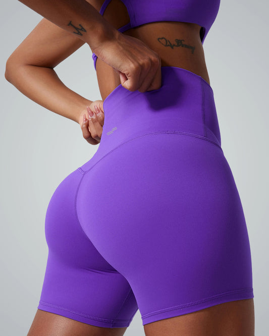 Bandsam SereneFit Shorts in purple; high-waisted, flexible activewear ideal for yoga, pilates, lounging. Stretch, support, comfort for women.