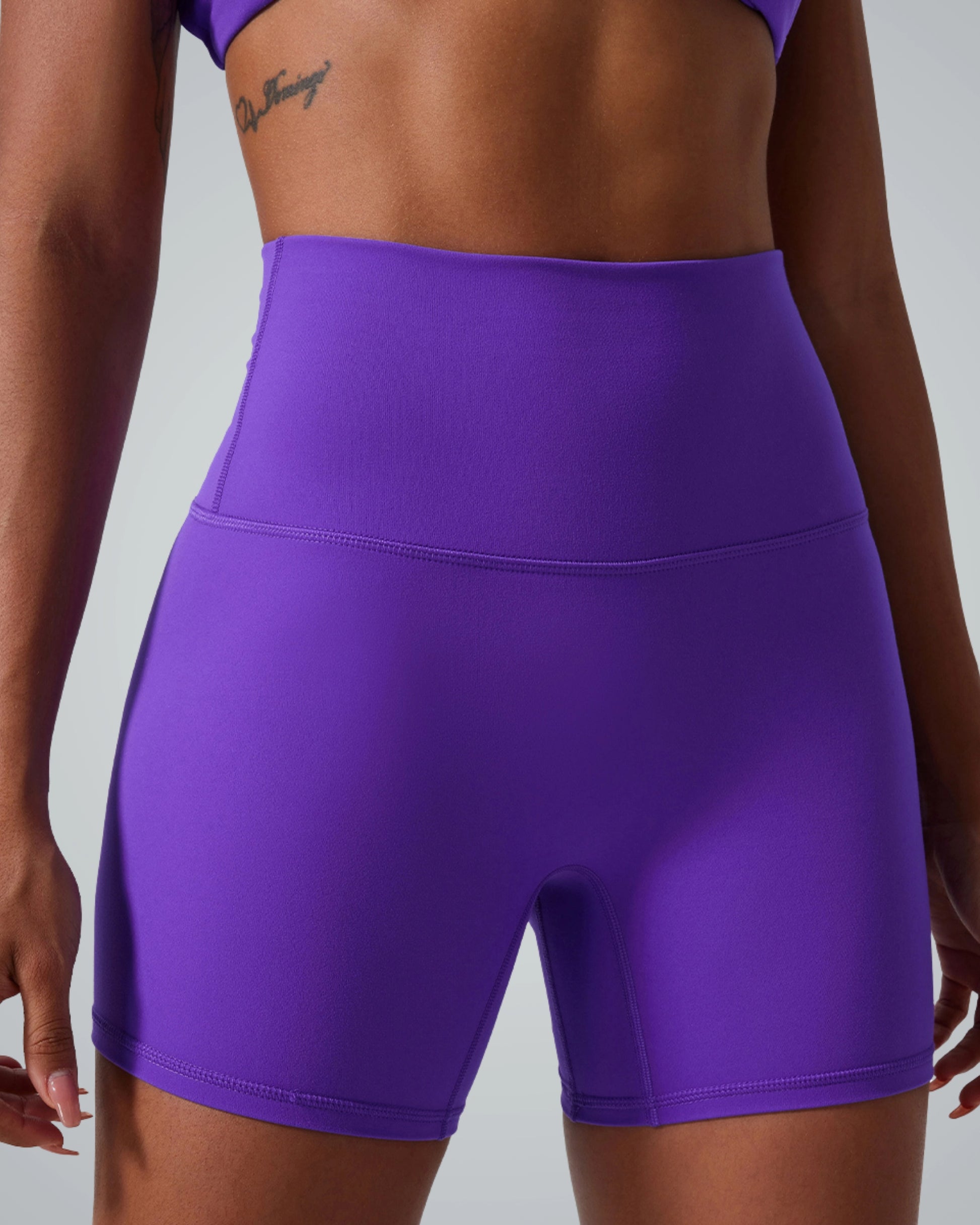 Bandsam SereneFit Shorts for women in purple, high-waist, soft stretch activewear ideal for yoga, pilates, workouts, and relaxation.