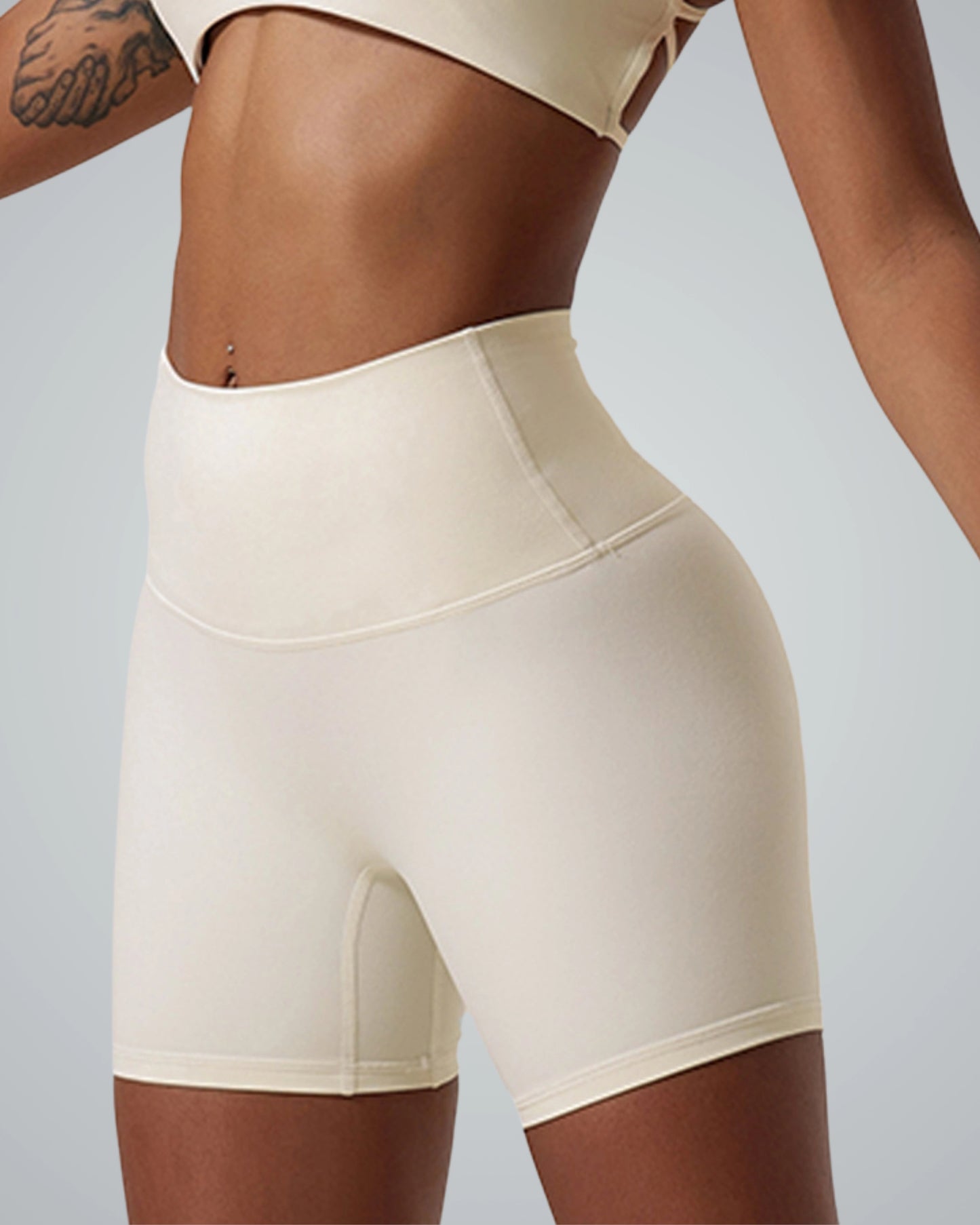 A woman wearing Bandsam SereneFit high-waist shorts, ideal for yoga, pilates, and workouts. Soft, flexible activewear for women.