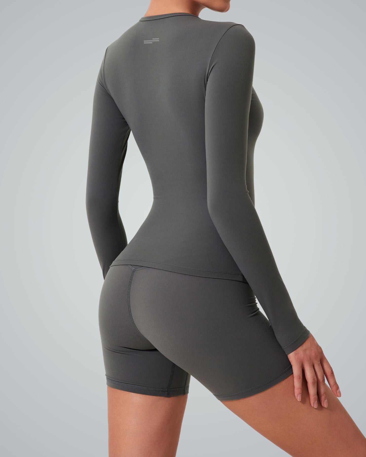 Bandsam SereneStretch Top in gray, women's activewear for yoga and workouts, featuring long sleeves and soft, stretch material.