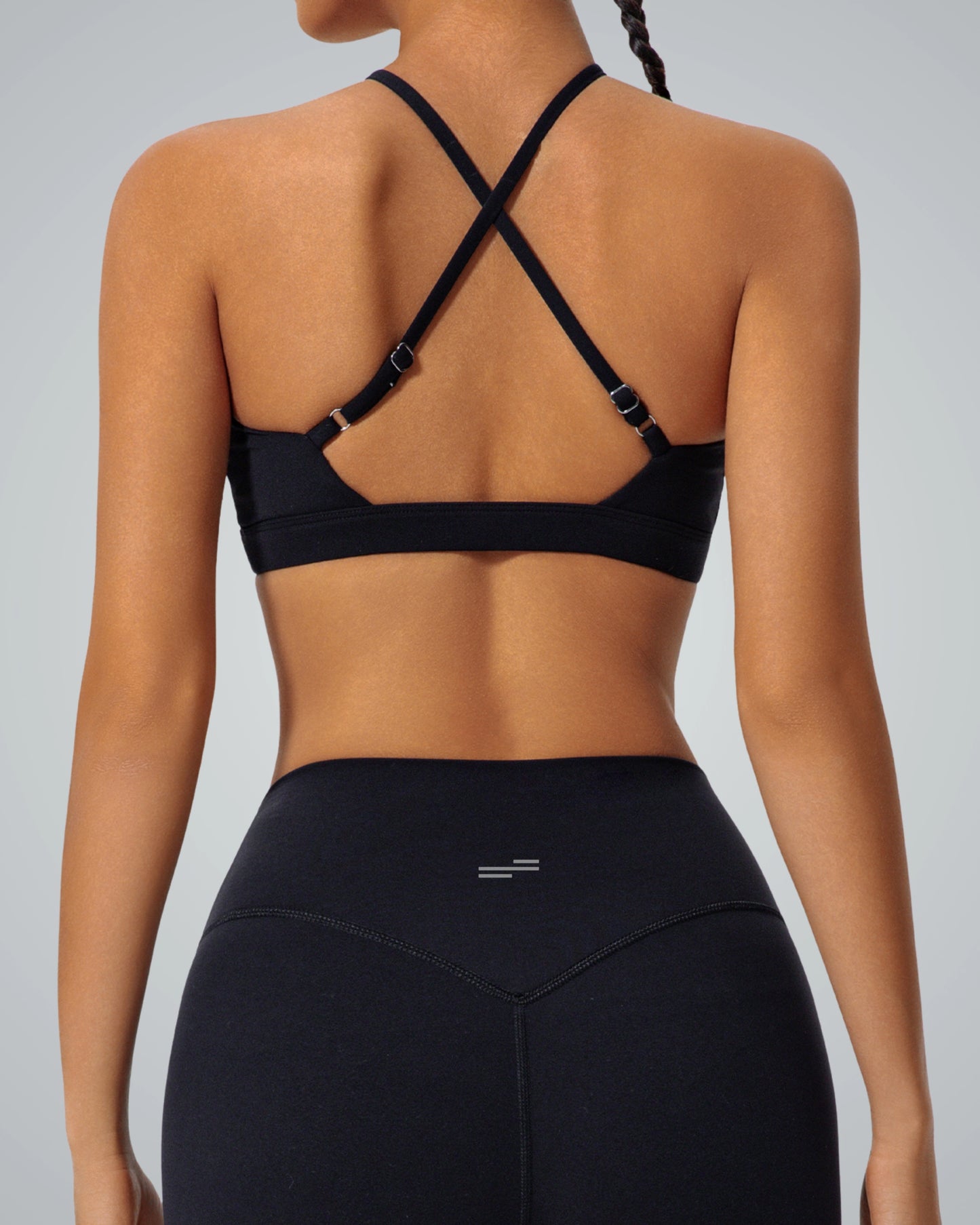 Back view of Bandsam ShapeSync Bra with crisscross design, ideal for stretch, yoga, pilates, and activewear comfort.