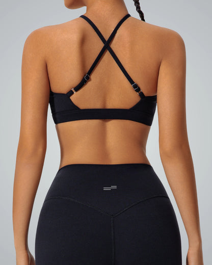 Back view of Bandsam ShapeSync Bra with crisscross design, ideal for stretch, yoga, pilates, and activewear comfort.