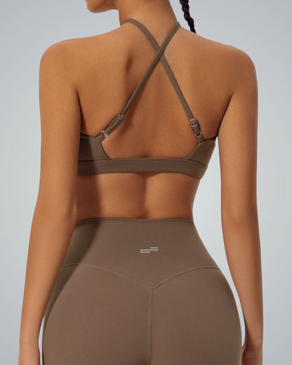 Back view of model wearing Bandsam ShapeSync Bra showcasing stretch, comfort, and crisscross design; perfect for activewear and relaxation.